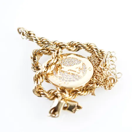 Diverse guld, 18k Vikt: 9,1 g