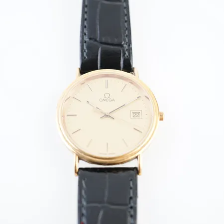 Herrur Omega, quartz, ca 33mm, 18k, batteribyte krävs