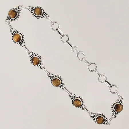 Armband med tigeröga, längd 17,5-20cm, bredd 1-7,5mm, silver 925/1000 Vikt: 7,2 g