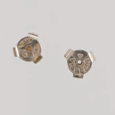 2 Låsstopp, 18K 0,5g.