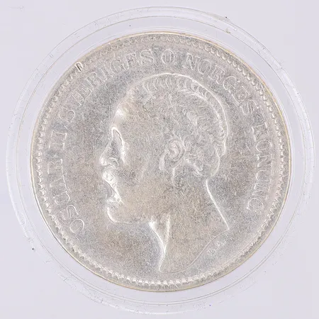 Mynt Sveriges första 2-krona i silver, Oscar II Sveriges och Norges konung 1877, 800/1000 silver, plastetui och box Vikt: 14,7 g