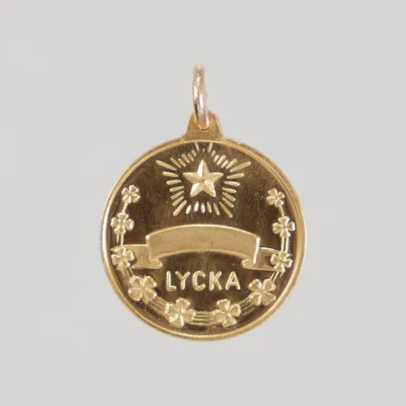 Hänge Lycka Ø15mm, 18K,  Vikt: 2,4 g