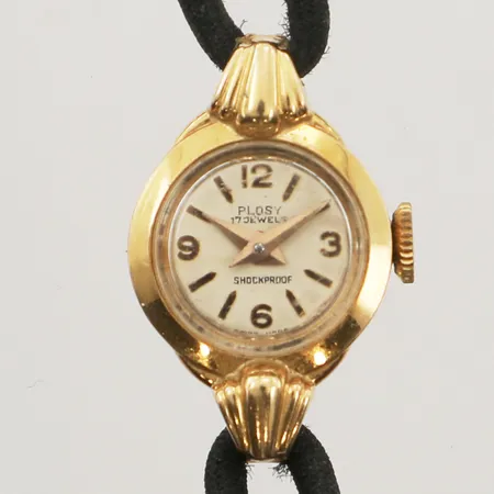 Damur Plosy 18K, manuell, 14,8mm, boettnr 93 113, skadat glas, urtavla och tygarmband, inga tillbehör.