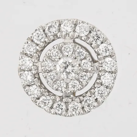 Ett udda örhängen med briljantslipade diamanter totalt ca 0,20ct, Ø8mm, 18K vitguld Vikt: 1,2 g