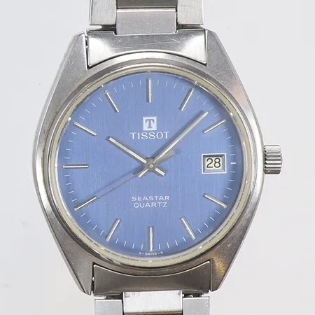 Herrur Tissot Seastar Ø35mm datum, quartz (går ej), troligen servicebehov, krona, med repor och slitage, med länk med box 