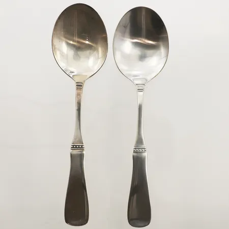 Två skedar, modell Uppsala, längd 17cm, 830/1000 silver  Vikt: 81,2 g