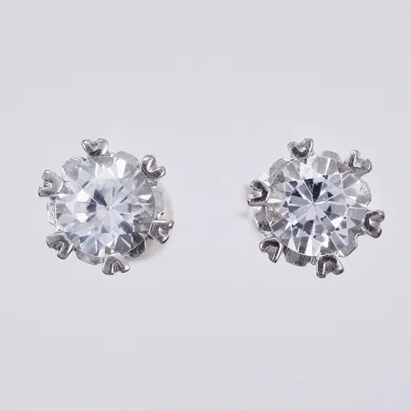 Ett par örhängen med stenar, Ø ca 6,5mm, saknar stoppers, ostämplade, 18K Vikt: 1,3 g