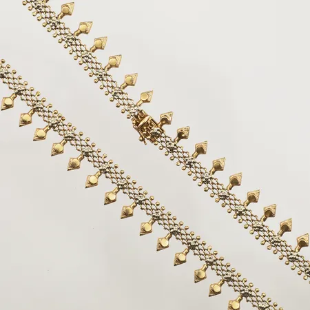 Collier, längd 42cm, bredd 14mm, tvåfärgat, skadat, 18K Vikt: 25,1 g