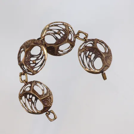 Armband i brons design Karl Laine längd ca 19cm bredd 32mm  visst slitage, ca 1970-tal 