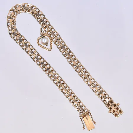 Armband X-länk, längd 19,5 cm, bredd 6 mm, 18K. Vikt: 12,3 g