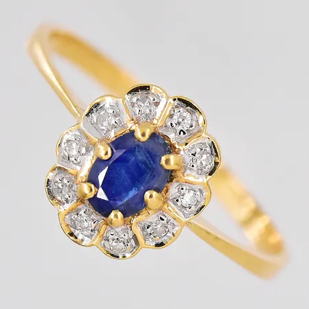 Caromséring med diamanter ca 0,05ctv, stl 20, nagg blå sten, 18K Vikt: 2,7 g