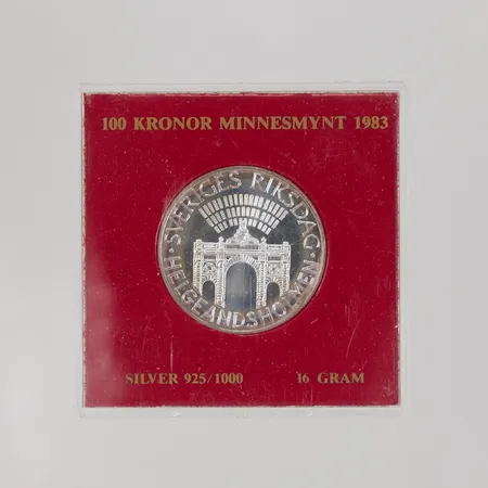 Mynt Sveriges Riksdag Helgeandsholmen, 1983, nominellt värde: 100kr, plastetui, 925/1000 silver Vikt: 16 g