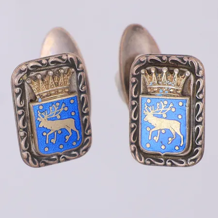 Ett par manschettknappar Lapplands landskapsvapen emalj 18,3mm, 12,5mm, Lagerströms Fabriks Aktiebolag, kattfot 830/1000 silver  Vikt: 11,3 g