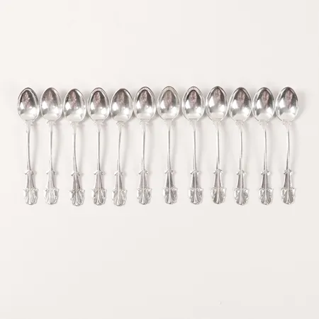 Tolv moccaskedar, CG Hallberg, längd 9,5cm, smärre slitage, silver.  Vikt: 97,7 g