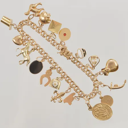 Armband, Bismarck med 18 Berlocker, 18,5cm, bredd: 5mm, slitet lås, 18K, 25,4g.