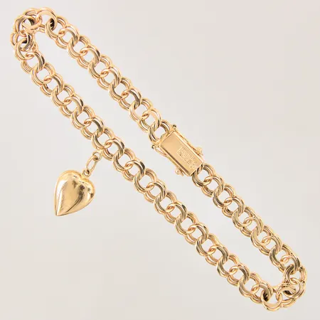 Armband Bismarck med en integrerad berlock i form av ett hjärta, längd 21cm, bredd 6mm, berlock med smärre buckla, 18K  Vikt: 14,7 g