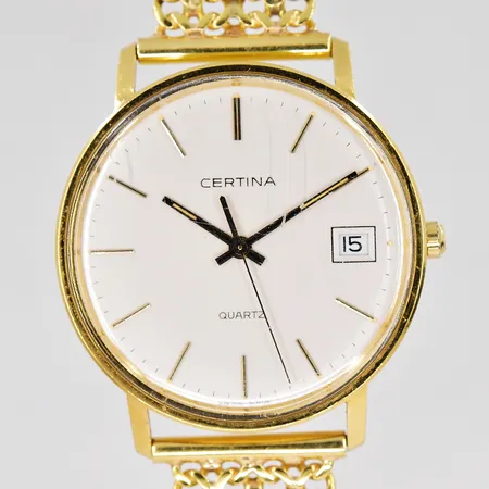 Herrur Certina 18K, Ø 33,5mm, quartz, datum, graverad boett, armband Fiskben 18cm inklusive uret, bredd 15mm, 2 extra länkbitar medföljer, 18K