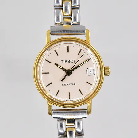 Damur Tissot Seastar, Ø 22mm, 18K, quartz, datum, står still, graverad boett, stålband ej original, medföljer moccaband original, etui