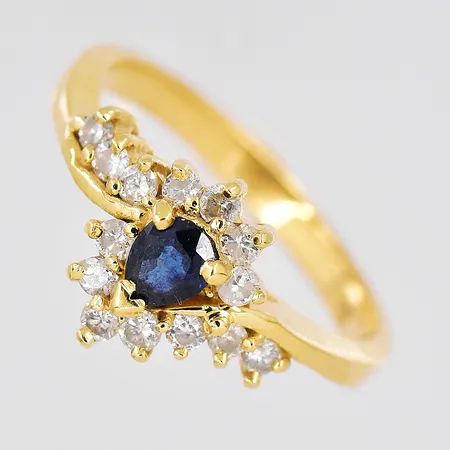 Ring med diamanter ca 0,15ctv, blå sten, stl 16¼, 18K Vikt: 3,4 g