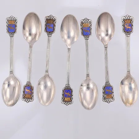 7 kaffeskedar Lapplands vapen, gravyr, Wahlbergs Guldsmedsaffär Ragnar, kattfot 830/1000 silver Vikt: 91 g