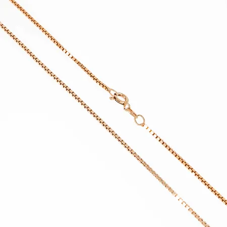 Kedja Venezia i förgyllt silver (925/1000). Den är 60 cm lång, 1,4 mm bred och väger 6,5g. Springring. 