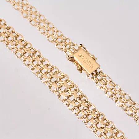 Collier i 18K guld, 39cm, X-länk, docerat, bredd 6,5-9,5mm, tillverkad av D Ekström Aktiebolag, år 1972, vikt 17,71g.