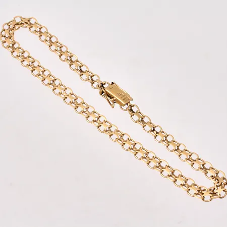 Armband i 18K guld, 22,5cm, X-länk, bredd 5mm, tillverkad av Ädelsmycken Aktiebolag, år 1964, vikt 6,89g.