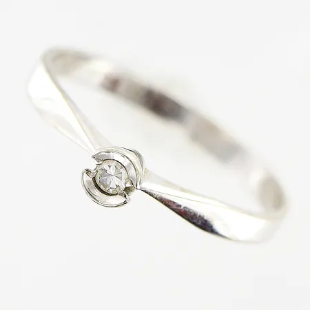 Ring 8/8-slipad diamant 0,03ct, enligt gravyr, stl 16½, vitguld, 18K  Vikt: 1,3 g