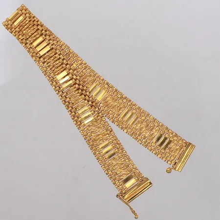 Armband 19,5cm, bredd 12,5mm, ojämnheter, 21K Vikt: 21,3 g