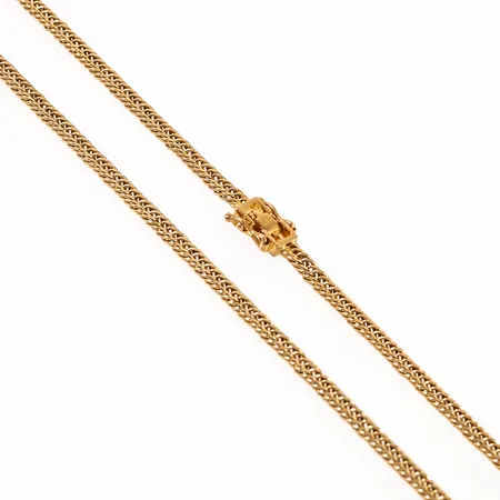 Kedja dubbelpansar i 18K guld. Ihålig modell. Den är 46 cm lång, 2,8 mm bred och väger 5,9g. Viklås & säkerhetsåttor.