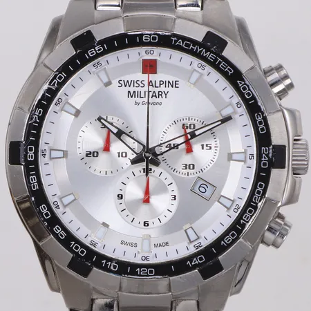 Herrur Swiss Alpine Military, Stål, quartz, referensnummer: 7043.9LE, Ø ca 46mm, stållänk, datum, kronograf, manual, bruksslitage, inga övriga tillbehör.