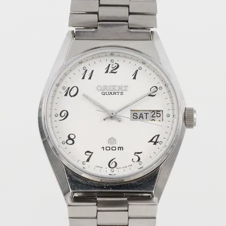 Herrur Orient diameter 35 mm,repor,fungerar ej.