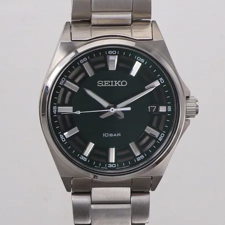 Herrur Seiko, stål, quartz, Ø41mm, boettnummer: 6N52-00G0, serienummer: 1D7295, grön urtavla, stållänk, datum, batteribyte krävs, box.