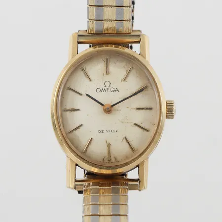 Damur Omega De Ville 18k i uret metall i bandet,fungerar ej gravyr/slitage,ca 23x20 mm. Vikt: 0 g
