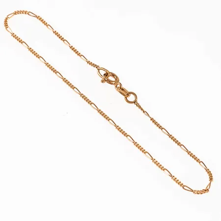 Armband figaro i 18K guld. Det är 18 cm långt, 1,2 mm brett och väger 1,1g. Springring. Från Balestra.