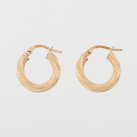 Örhängen paret diameter ca 15.9 mm,18k. Vikt: 1,3 g