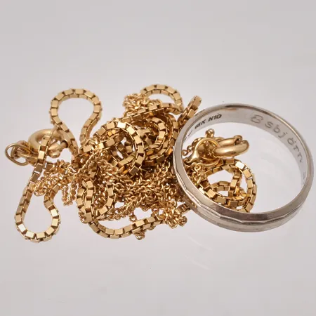 Diverse defekt guld, 18K, vikt 9,34g.