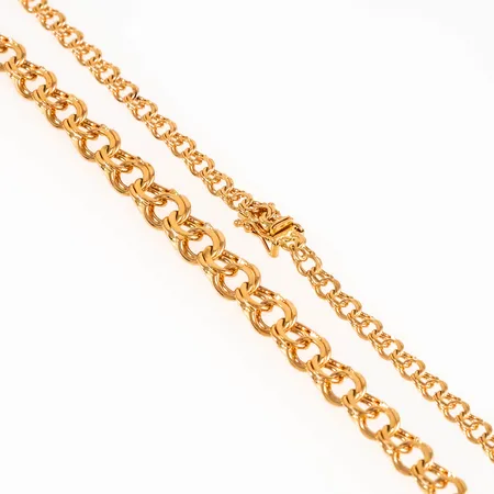 Collier Bismarck i 18K guld. Det är 42,5 cm långt, 4 - 8 mm brett och väger 19,8g. Fint skick. Kistlås. Stämplad KFS (Svedbom & Co), 18K, kattfot.