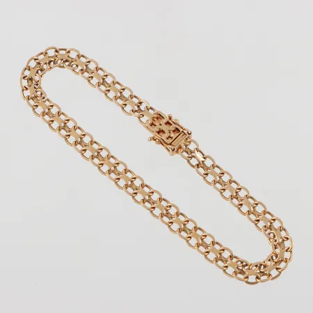 Armband 18k X-länk,längd ca 19 cm,bredd 5.6 mm. Vikt: 9,4 g