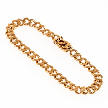 Armband pansar i 18K guld. Det är 19 cm långt, 6,6 mm brett och väger 20,7g. Kistlås. Aningen nött i länkarna närmast låset. Kattfot.