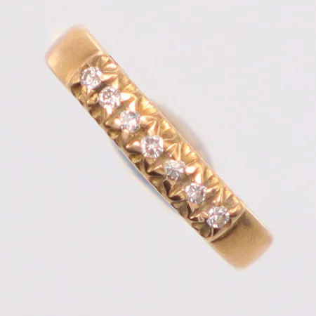 Ring Ø15¾ 7 diamanter totalt 0,10ct enligt gravyr, gravyr, 18K Vikt: 2 g