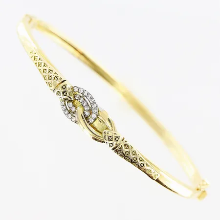 Armring, vita stenar, 62x52mm, öppningsbar, ihålig, 18K.  Vikt: 8,1 g