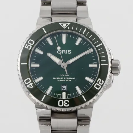 Herrur Oris Aquis Date, stål, 43mm refnr 01 733 7730, serienr: 3738646 , automatisk, datum, stållänk, viklås, 2 länkbitar, manual, certifikat , box, ytterkartong.. Skickas med postpaket.