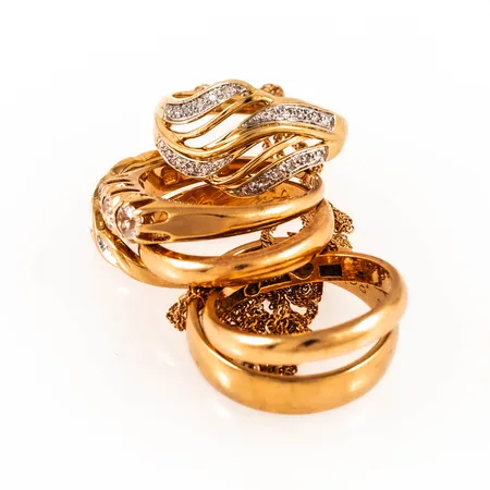 Diverse defekta smycken 18K 21,2g.