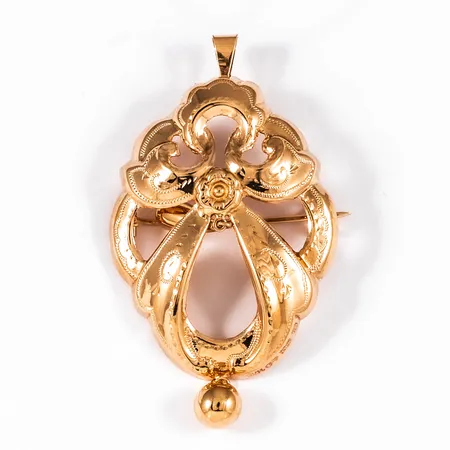 Brosch / Hänge Allmogestil i 18K guld. Det är 29 mm brett, 47,5 mm långt och väger 3,9g. Stämplad C9 (1953), GVH (Guldvaruhuset AB, Stockholm), 18K, kattfot.