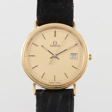 Herrur 18k Omega gravyr,tickar igång men ej funktionstestad,diameter ca 32.3 mm. Vikt: 0 g