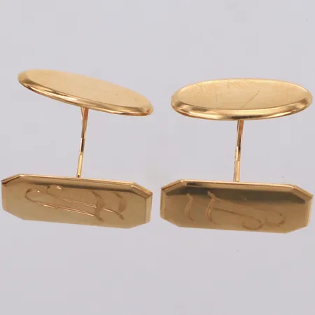 Ett par manschettknappar med monogramgravyr, mått ca 12x20mm, 18K  Vikt: 6,3 g