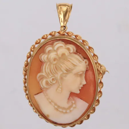 Brosch/ hänge med camé, 40X25mm, nålen krokig, 18K. Bruttovikt: 7,5g Vikt: 0 g