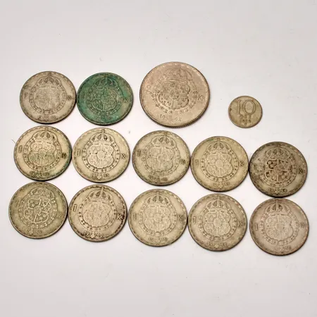 14st mynt i silver, vikt 98,51g.