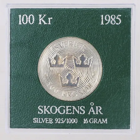Minnesmynt 100kr, Skogens år 1985, Ø32mm, plastetui, 925/1000 silver Vikt: 16 g